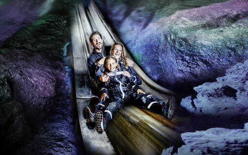 Berchtesgaden Salt Mine - Family on the slide © Salzbergwerk Berchtesgaden - Suedwestdeutsche Salzwerke AG